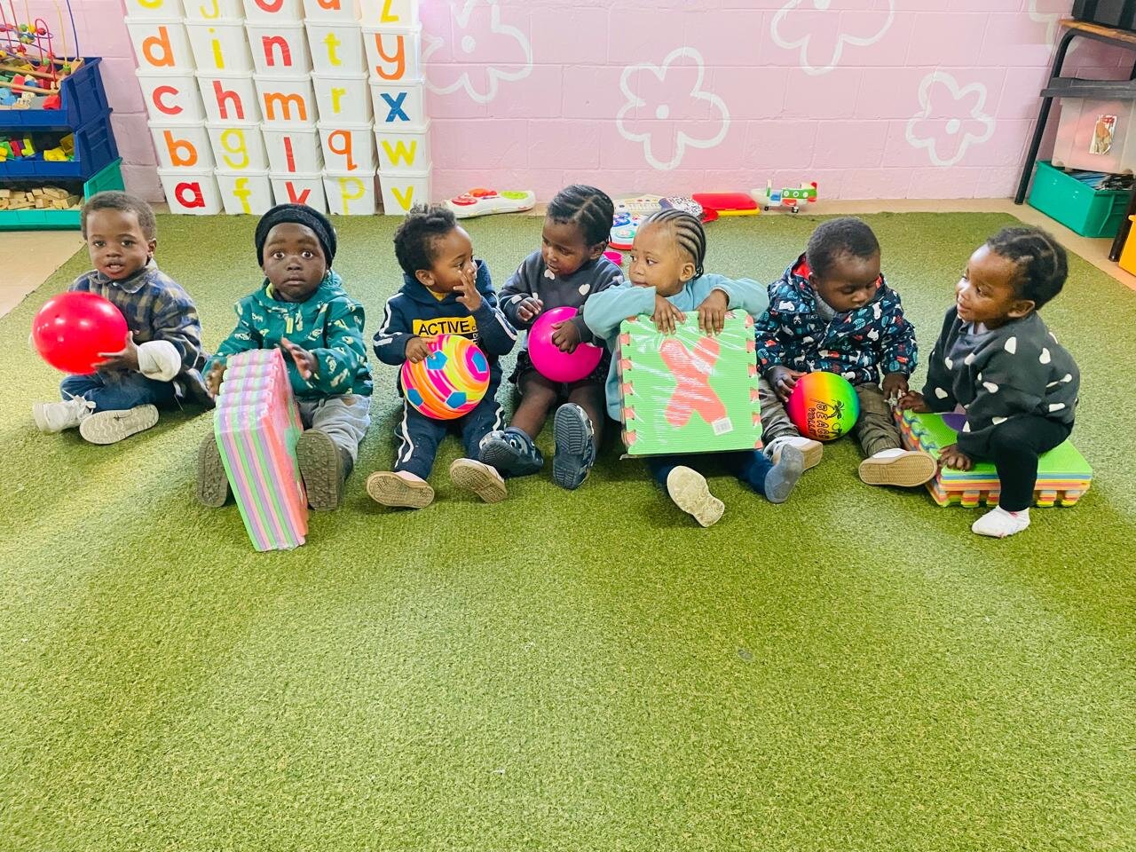 Children playing in their freshly painted classroom